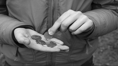 Hands with money change in them Hands with money change in them